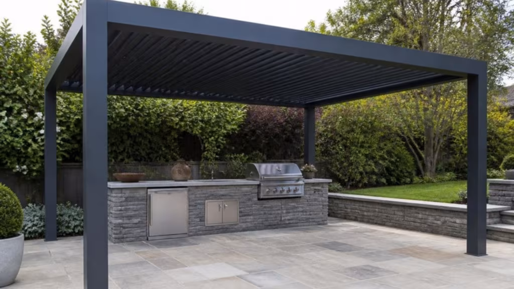 Fixed slatted aluminium pergola over an outdoor kitchen