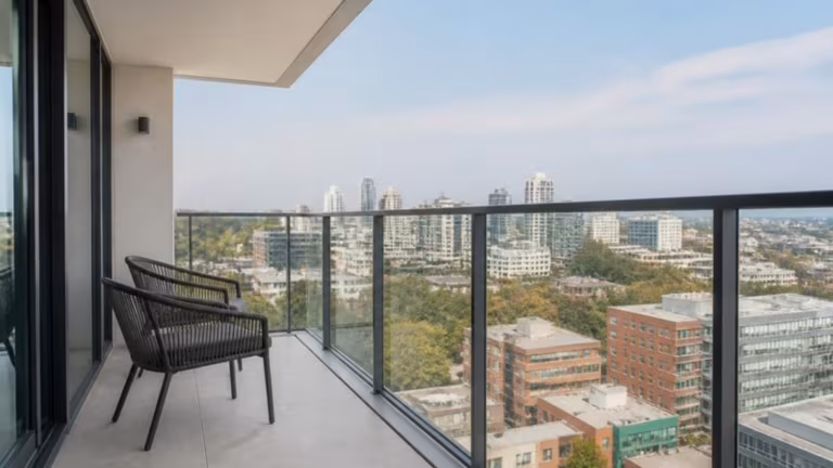 Apartment balcony with an aluminium framed glass balustrade