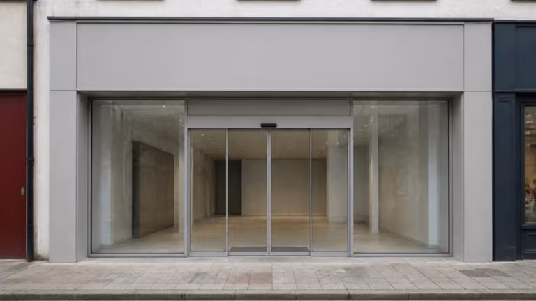 Frameless glass shopfront with automatic sliding doors
