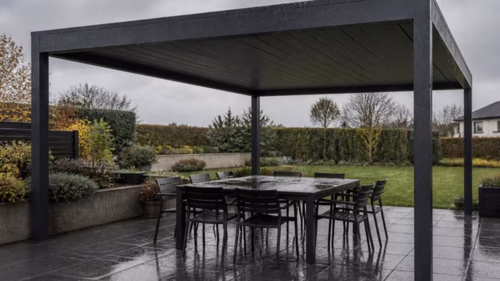 Louvred pergola closed in the rain over a dry dining table
