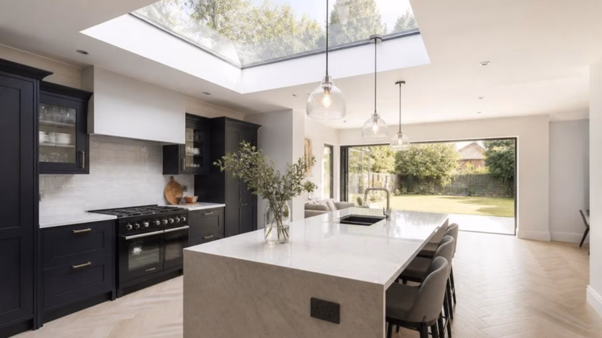 Flat rooflight above a kitchen island in a single-storey extension