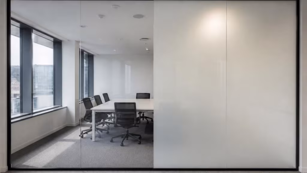 Smart glass partition half clear and half switched to opaque